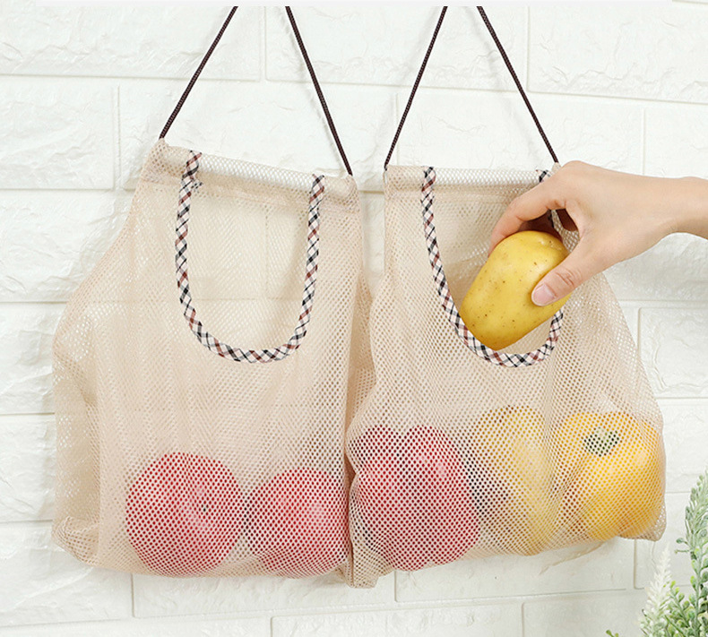 modern mesh hanging storage bag for fruits vegetables onions ginger garlic portable breathable kitchen organizer kitchen storage details 0