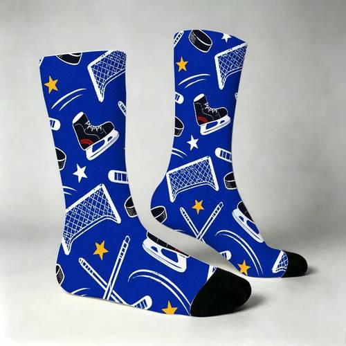 a pair of crew socks featuring ice hockey skates sticks and puck patterns unique athletic theme prints breathable stretchy fabric ideal for sports enthusiasts casual daily activities or novelty gift ideas