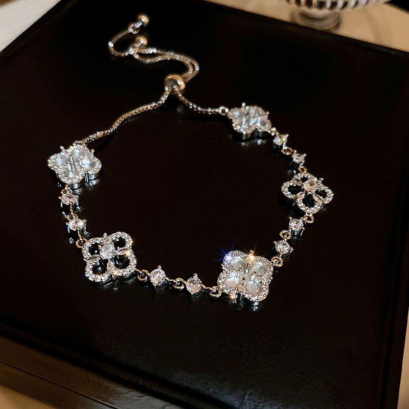 TEMU A Of Korean Four-petal Flower Bracelet With A Light Luxury And High-end Feel, Adjustable Temperament, For Women