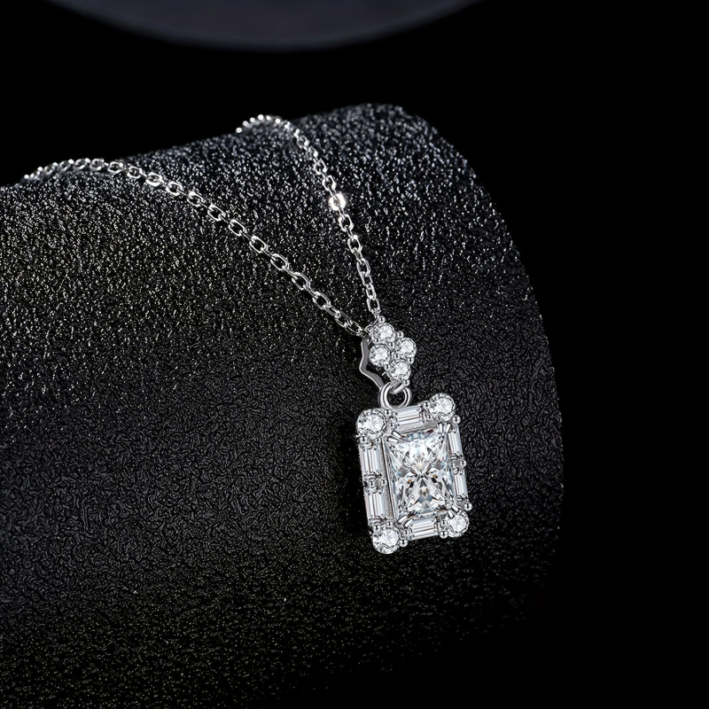 A Stunning Necklace Featuring A 1-carat Moissanite Pendant Shaped Like A Sugar Cube, From 925 Sterling Silver. Elegant And
