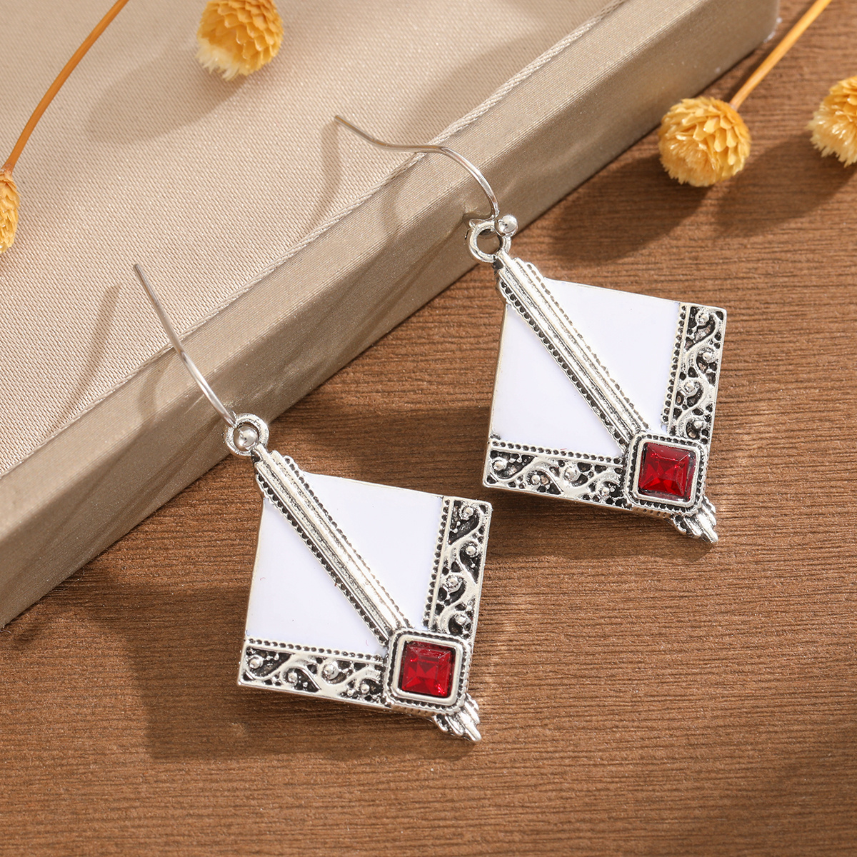 Image of Inlaid Synthetic Zirconia Edge With Scroll Pattern Carved Pendant Women's Earrings Suitable For Music Festivals, Vacation Travel, And Holiday Gatherings