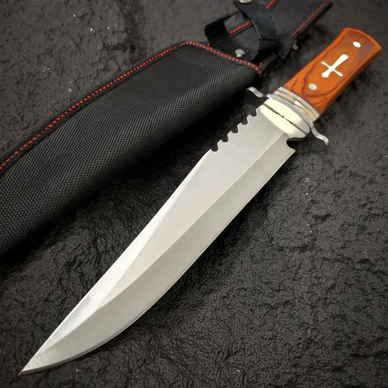 inch outdoor straight knife with a 7 4 inch blade length serrated design wooden handle with metal decoration with a black knife sheath a practical tool for the outdoors and a mens knife Product details 0
