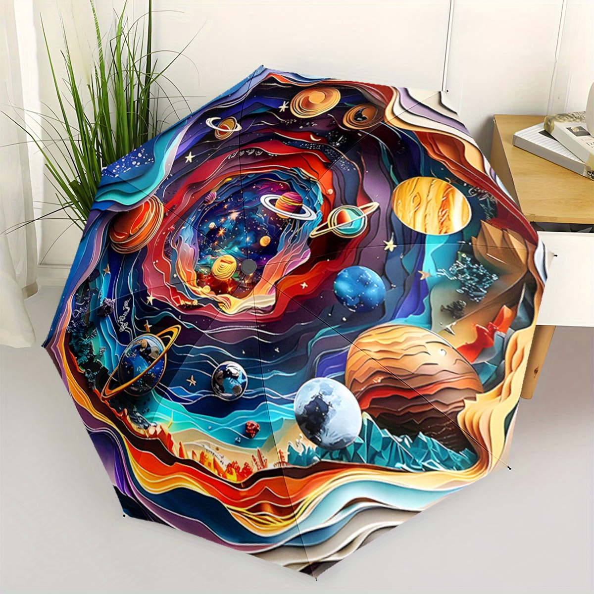 umbrella 2d flat printing automatic folding umbrella features a colorful   starry sky pattern with planets and stars sparkling   it has a portable foldable design and is a casual outdoor accessory suitable for   making it