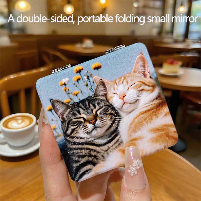 TEMU 【商品名】愛らしい猫のデザインが特徴的な、コンパクトでな両面折りたたみミラー。旅行や日常使いに最適で、女の子や女性へのプレゼントにも最適です。
