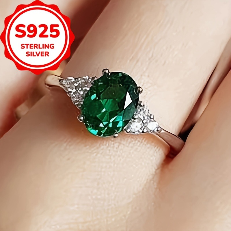 A Gorgeous And Classic S925 Sterling Silver Exquisite Green Oval Moissanite Ring | Suitable For Women' Holiday Wear | A Fashionable Proposal And Engagement Ring | For Her Anniversary Celebration.