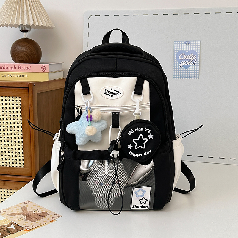 stylish nylon backpack with cute bunny charms lightweight design adjustable straps front mesh pocket happy little blue yellow black school or casual use everyday bag stylish backpack backpack for travel details 3