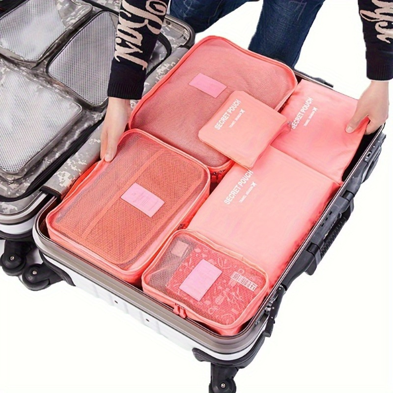 

A Set Of 6 Travel Organizers In A , Featuring A , Includes 3 Large And 3 Small Clothing Storage Bags Made Of Polyester Material, Not Washable - Ideal For Travel Use.