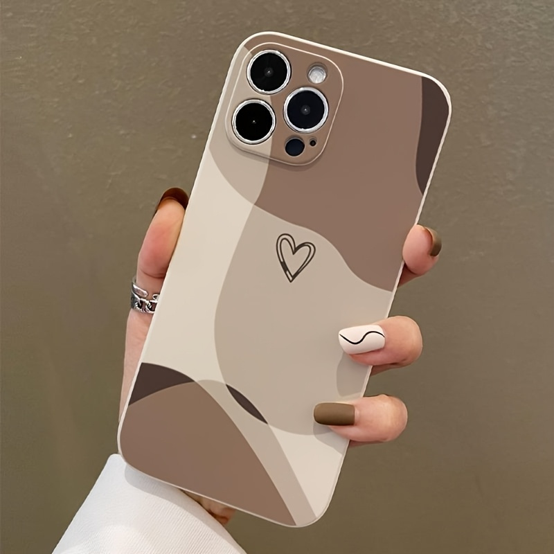 Light brown beige phone case, simple design with soft heart-shaped decoration, compatible with iPhone models 16, 15, 14, 13, 12, 11 Pro Max, XS, and XR