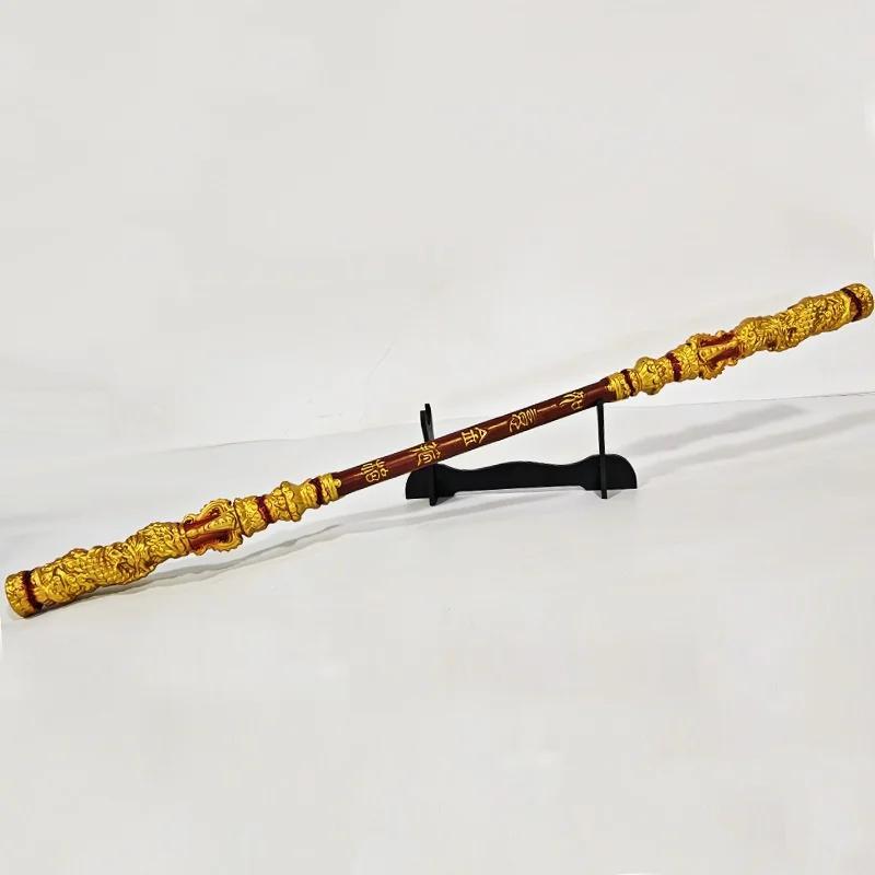 A Sun Wukong Stick with gold accents on a white background