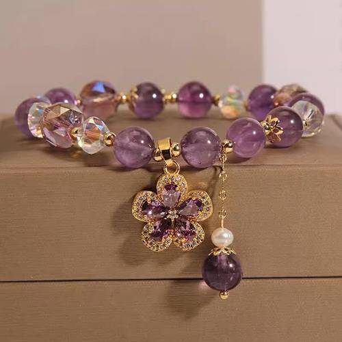 a womens designed natural amethyst bracelet featuring irregular crystals and synthetic zirconia with luxury minimalist style suitable for year round wear