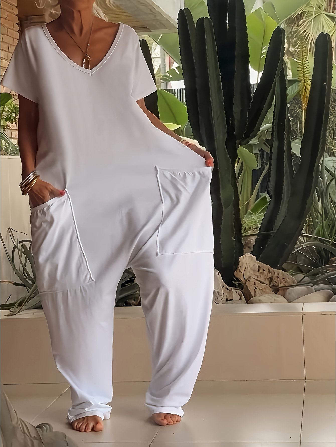 casual loose v neck short sleeve jumpsuit for women in solid color featuring side pockets