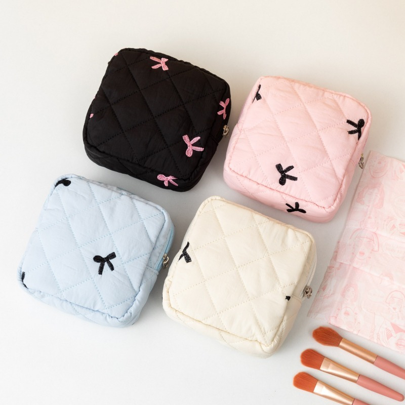 

A Cute And Bag For Sanitary Pads With A , Like Lipsticks.