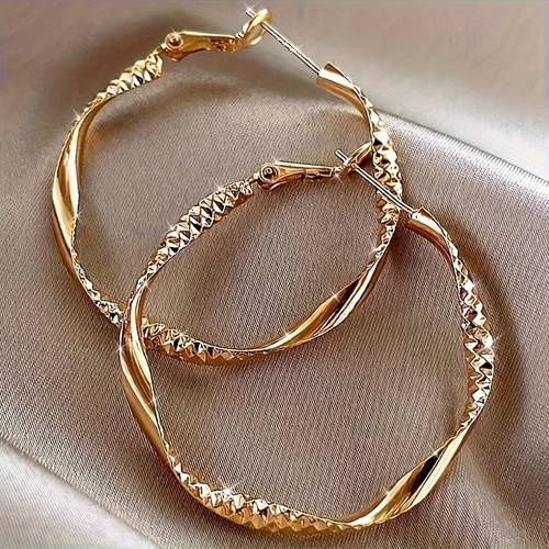 golden twisted hoop earrings for women elegant textured design with sparkling accents alloy stainless steel ear posts casual wear or parties unique and stylish jewelry novelty earrings