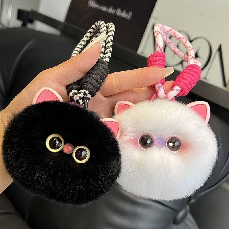 cat plush keychain sold on Temu United States