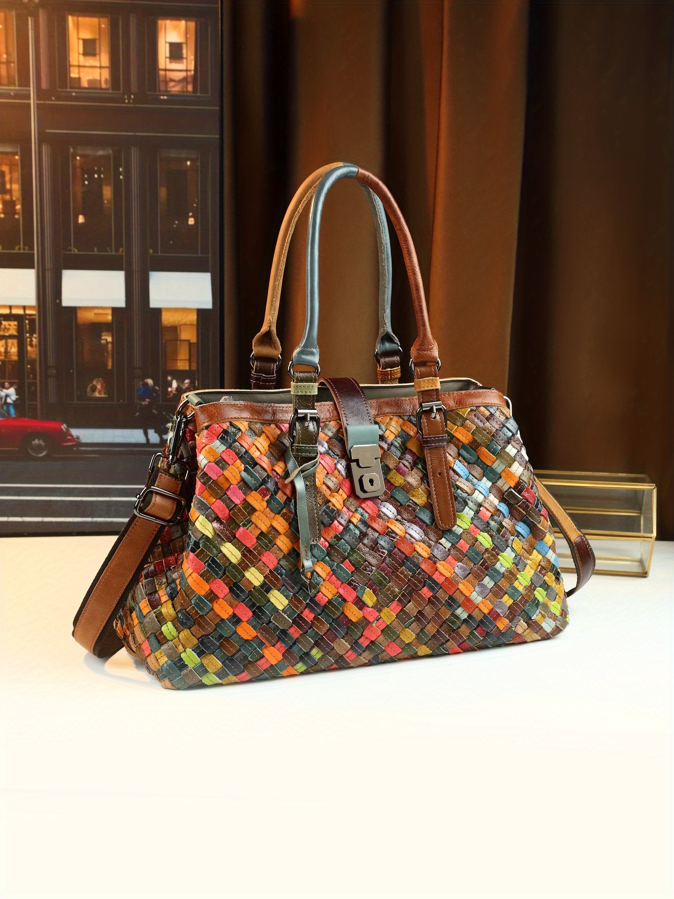 Handbag with model standing outdoors