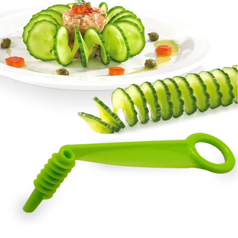 Man cutting a cucumber with a chef's knife. Thin slices of the