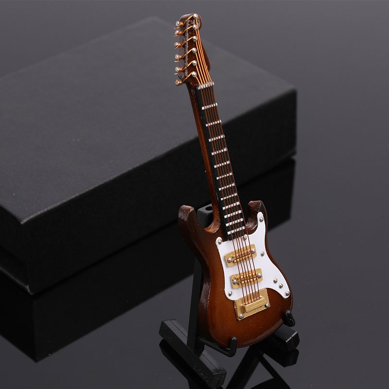 Modèle de guitare de boîte-cadeau Modèle de guitare en matière plastique  Mini instrument de musique ornement de bureau avec - Cdiscount Instruments  de musique