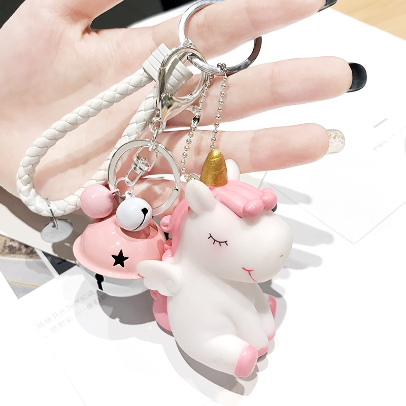 Cute Fur Ball Pom Pom Keychain with Unicorn Small Bell Princess Keyring for  Women Bag Purse Car Decoration at  Women's Clothing store