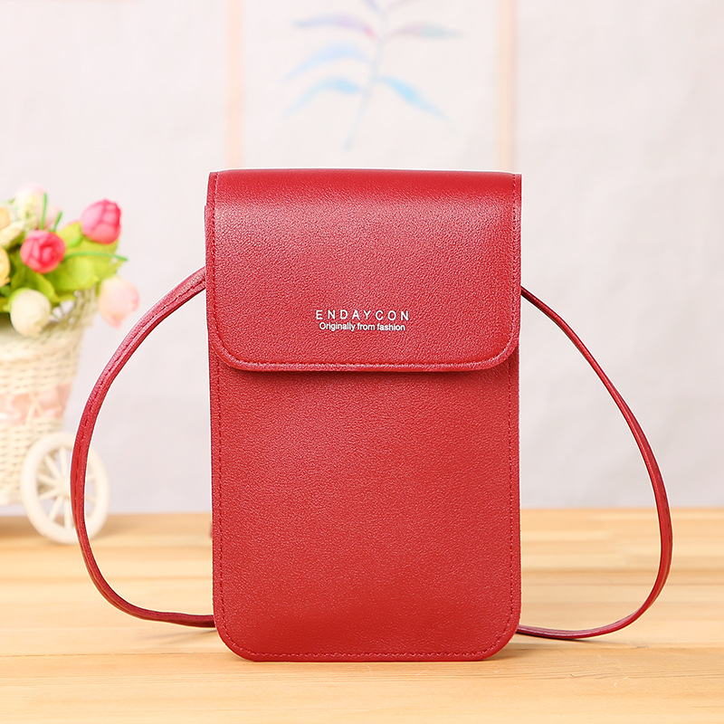 Crossbody purse with online phone window