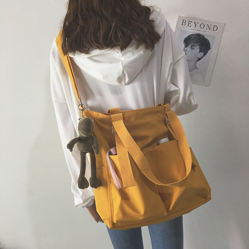 Beauty & The Beast Cross-body Book Bag in Yellow