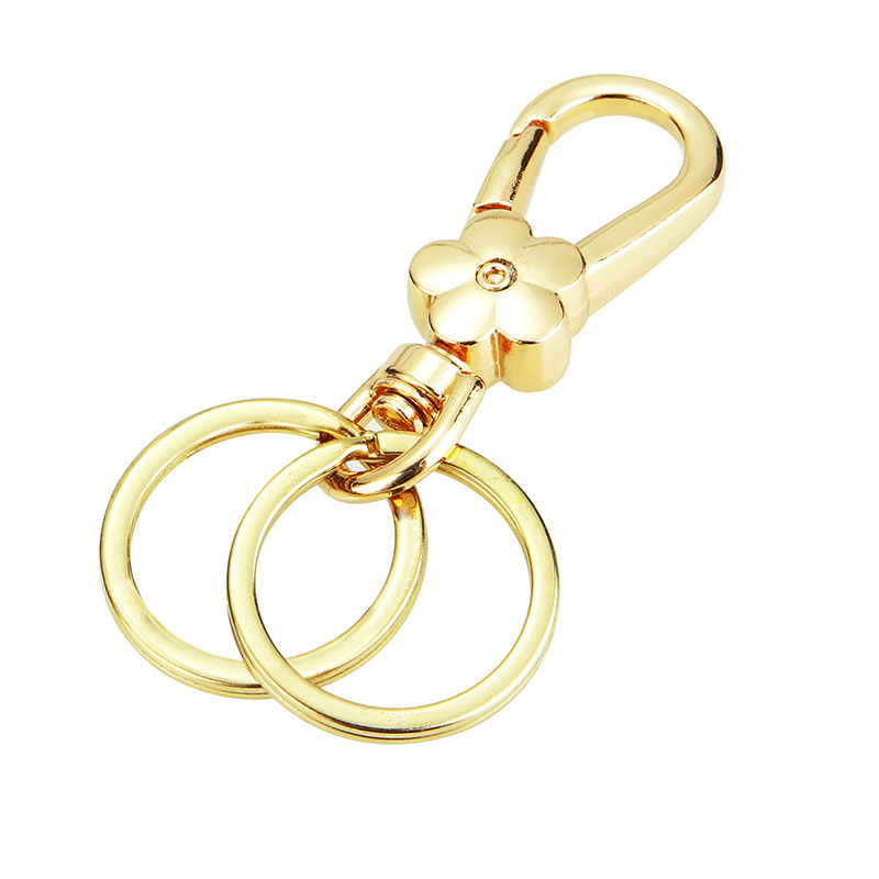 LOUIS VUITTON. Bag jewellery or key ring in gilded meta…