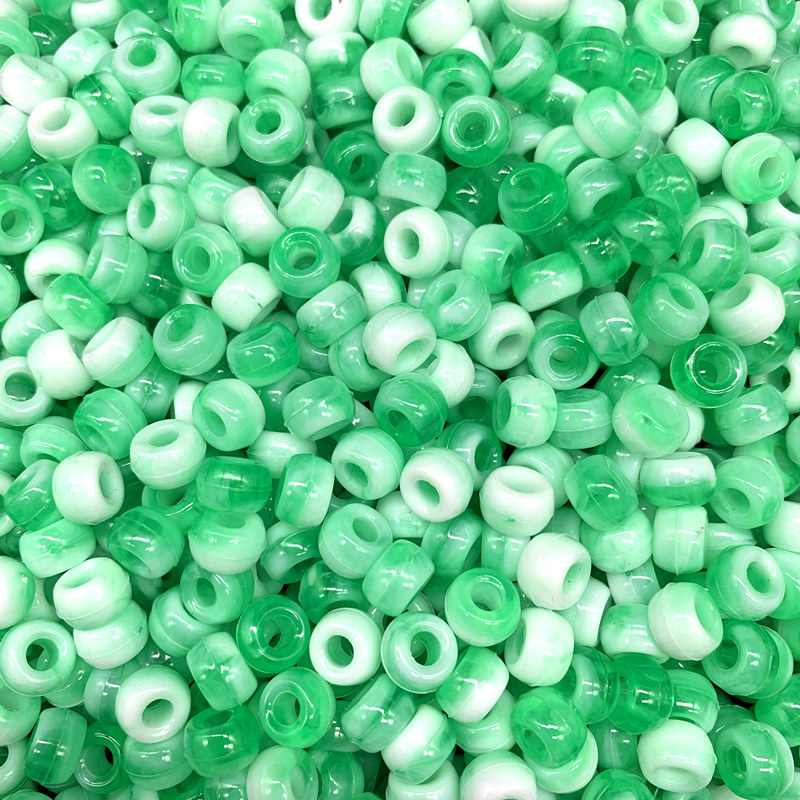 Perles en plastique (9mm.) vertes opaques