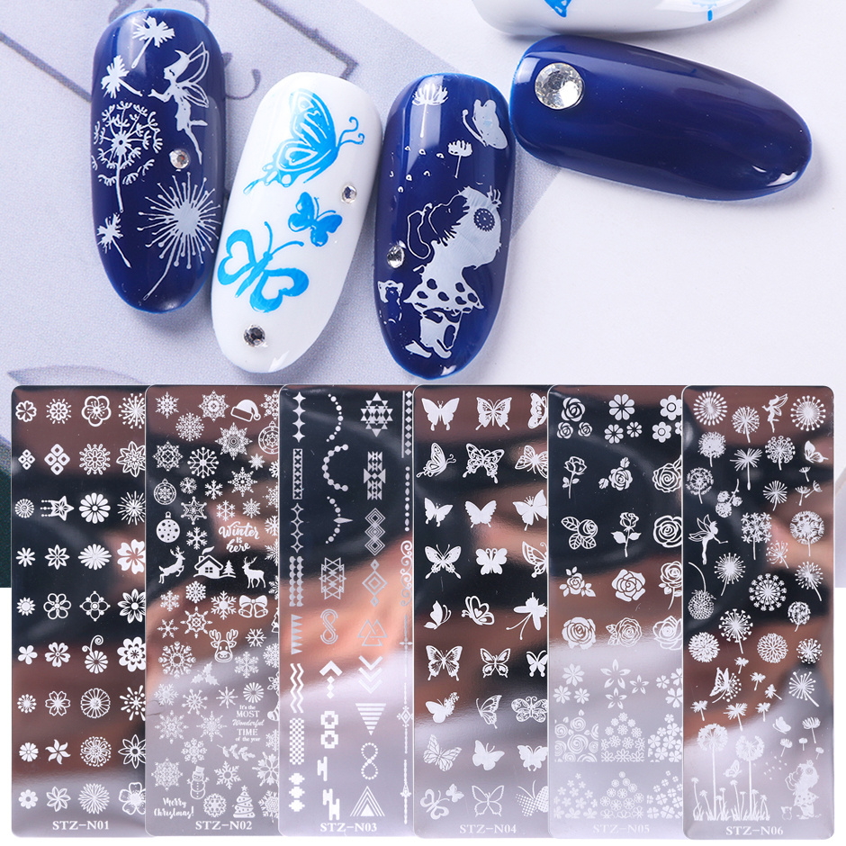 Nail Stamp Plate Kit 6 Pcs Nail Stamping Plates + 1 Stamper + 1 Scraper  Butterfly Flower Feather Flowers Maple Leaves Roses Nail Plate Template for