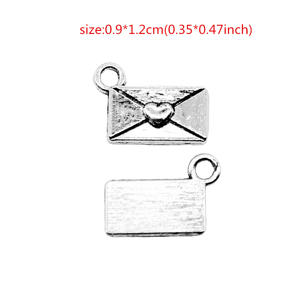 Envelope Charm, Made With Love Heart Pendant, Tiny Charms, 10mm x 6mm –  Paper Dog Supply Co