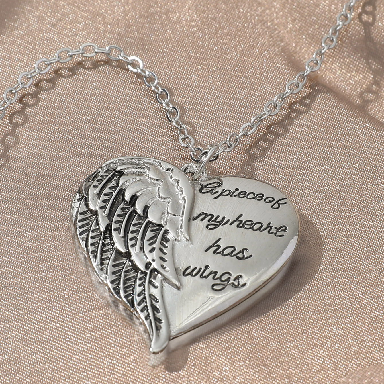 A piece of my heart sales has wings necklace