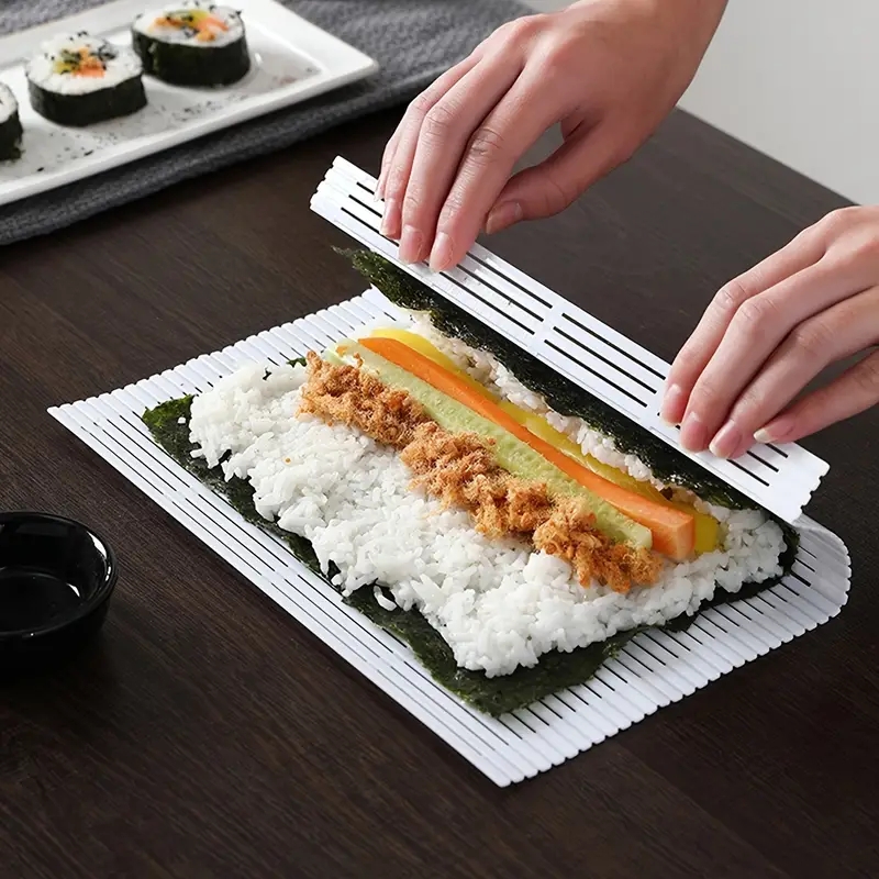 Kit para hacer sushi - Rodillo de sushi de silicona con paleta de arroz,  cortador de rollo y libro de recetas, kit completo de sushi DIY para el  rollo