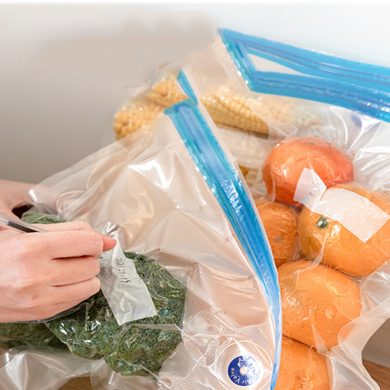 Vacuum bag sealer for food storage including 5 re-usable bags and