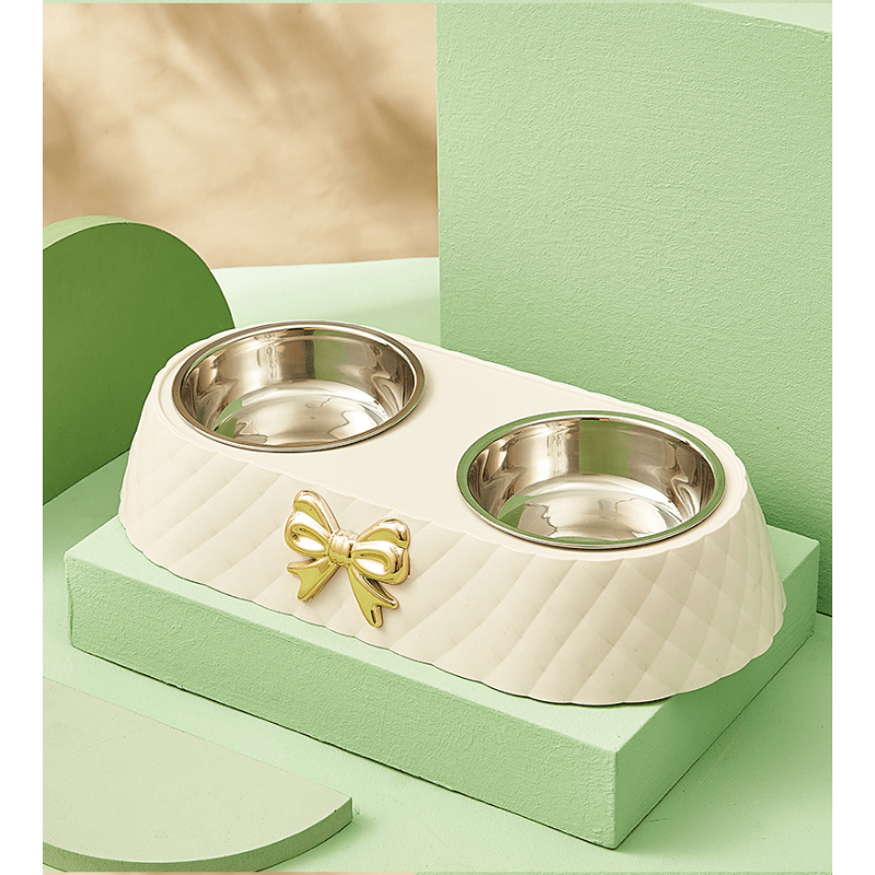 

Durable Stainless Steel Double Bowl For Cats And Dogs With Bowknot Carved Design - Perfect For Feeding And Hydration