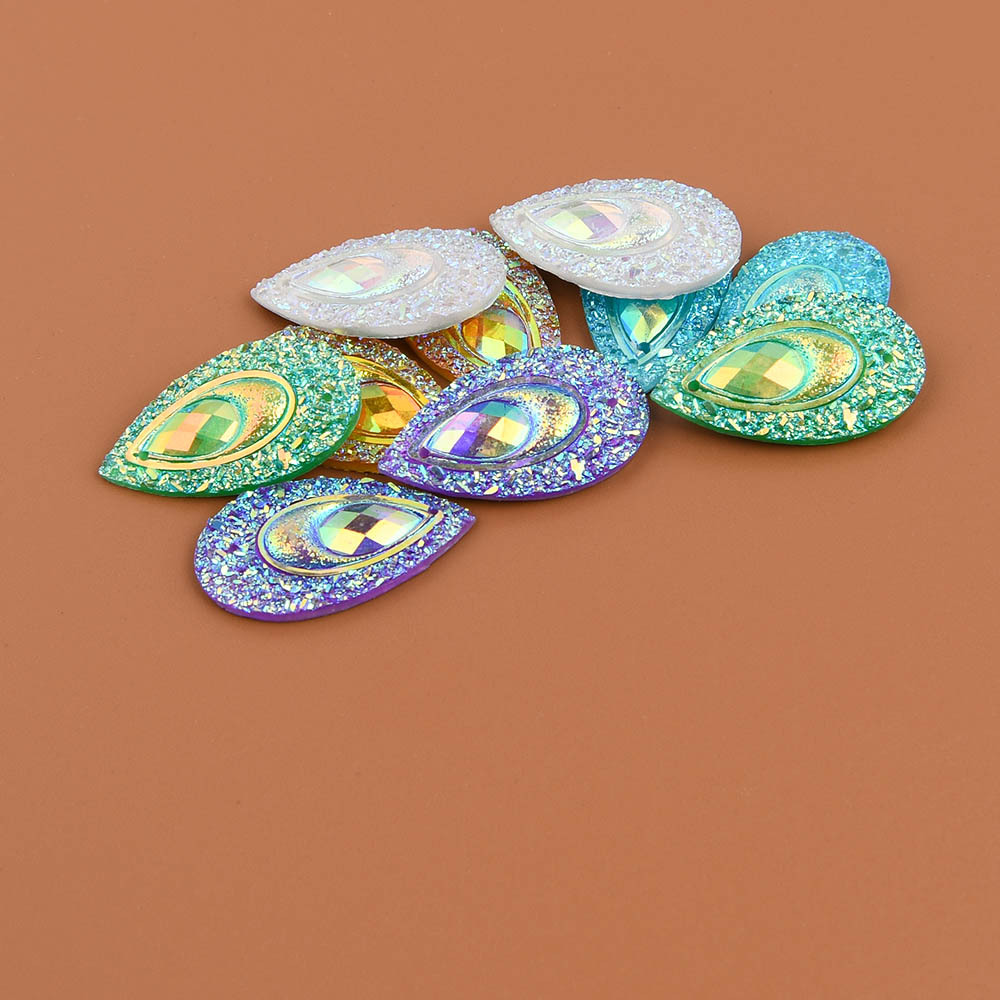 Magneti con fiori in resina colorata con punto luce strass