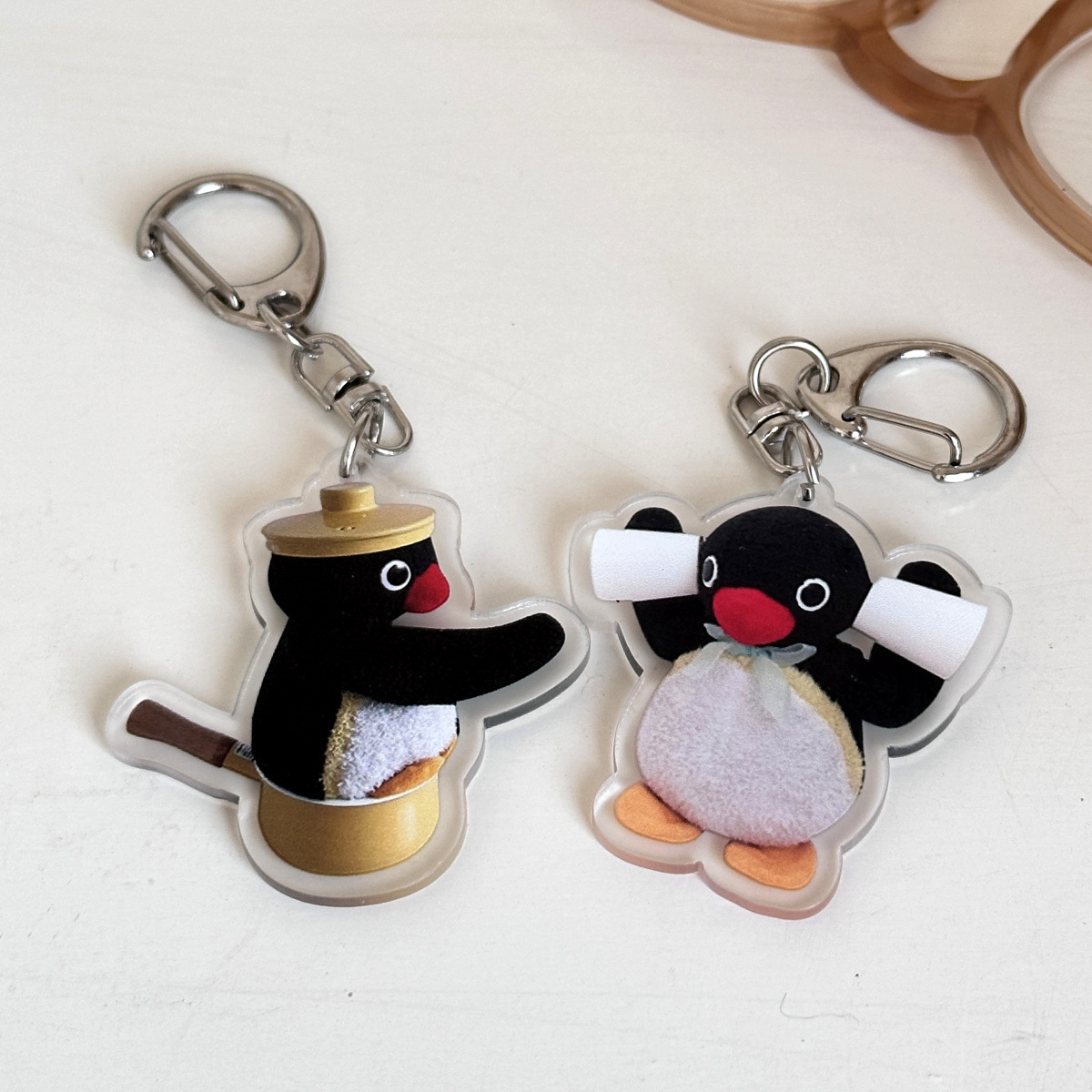 Porte-clef Maison bonheur - Pingouin à Roulettes