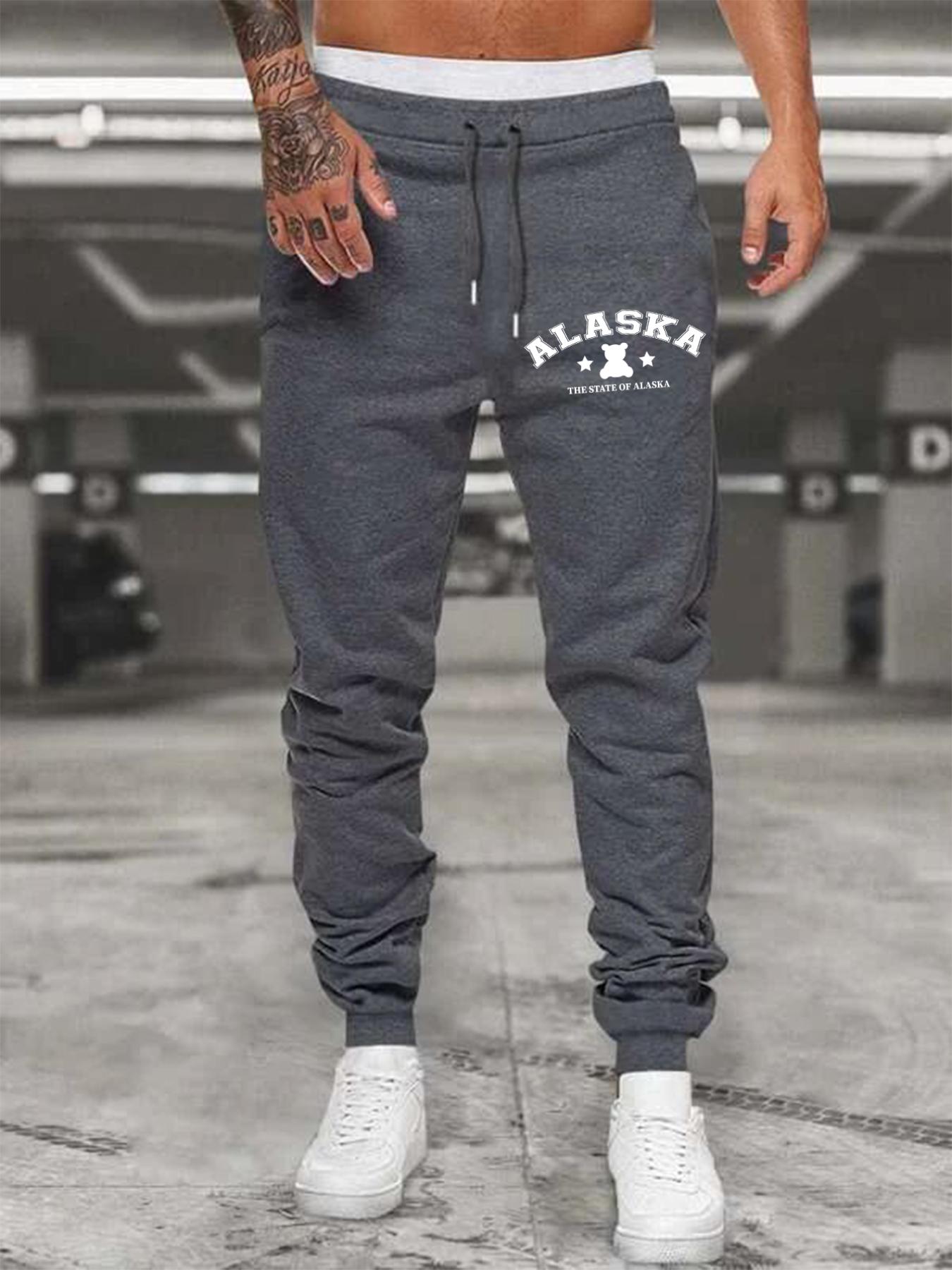 Jogging homme survêtement pantalon noir poches streetwear bande