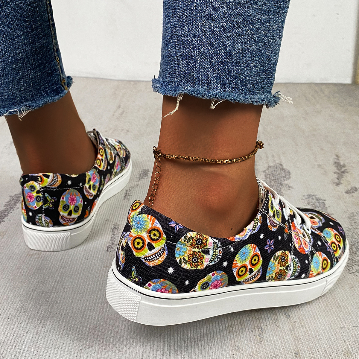 Vans women's skull on sale shoes