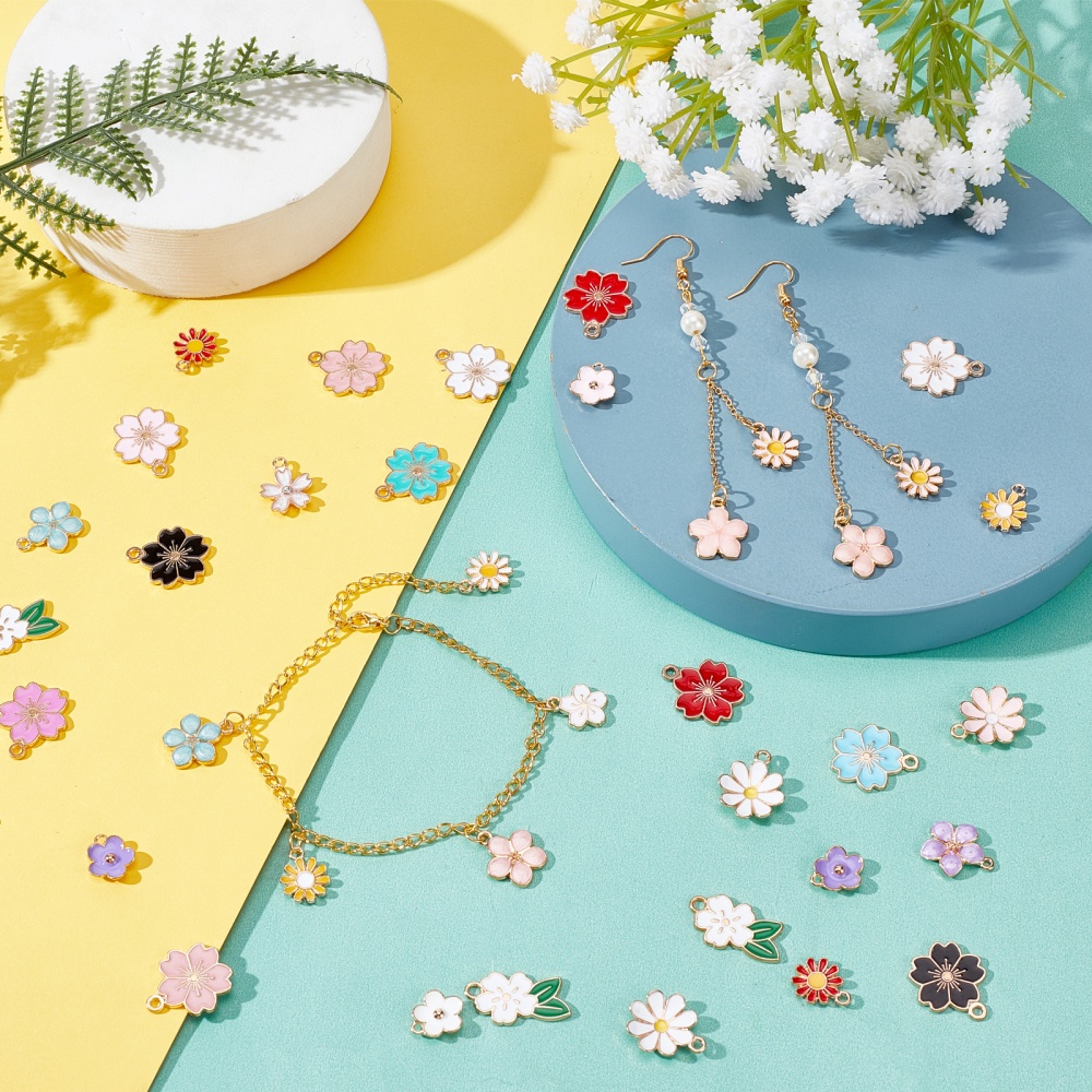 1 Box 26 Styles Enamel Flower Pendants 104Pcs Colorful Floral Themed Flower Charms Daisy Cherry Flower Dangle Golden Plated Enamel Charm for