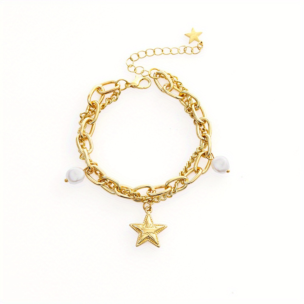 Adorable Yellow Gold Star Charm Bracelet