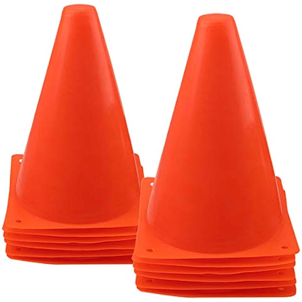 Premium Photo  Orange training cones on football field