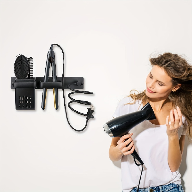 Hair dryer and outlet hair straightener holder