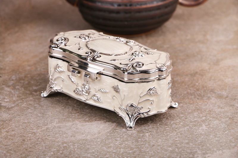 Very nice vintage silver plate jewelry box. I think it was $4