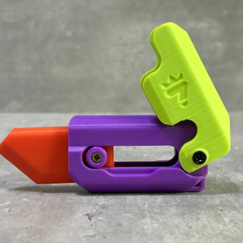 Extendable 3D Printed Gravity Radish Knife Toy With Carrot Design