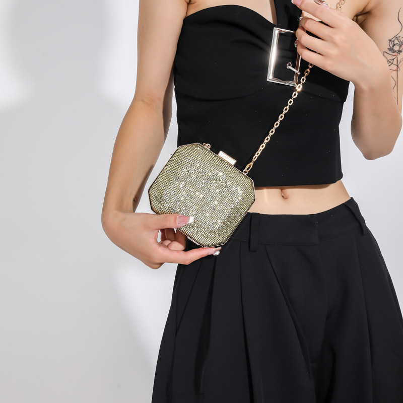 unique mini clutch with motif in leather