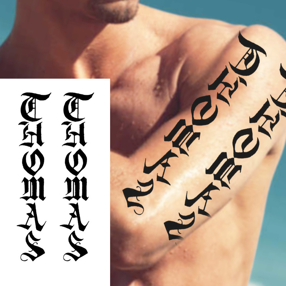 old english font tattoo on arm