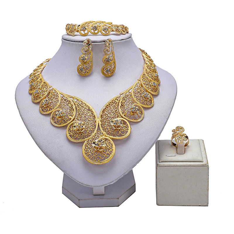 

Bollywood Style Earrings + Necklace + Bracelet + Ring Traditional Bridal Jewelry Set 18k Gold Plated Retro Flower Carving Match Daily Outfits