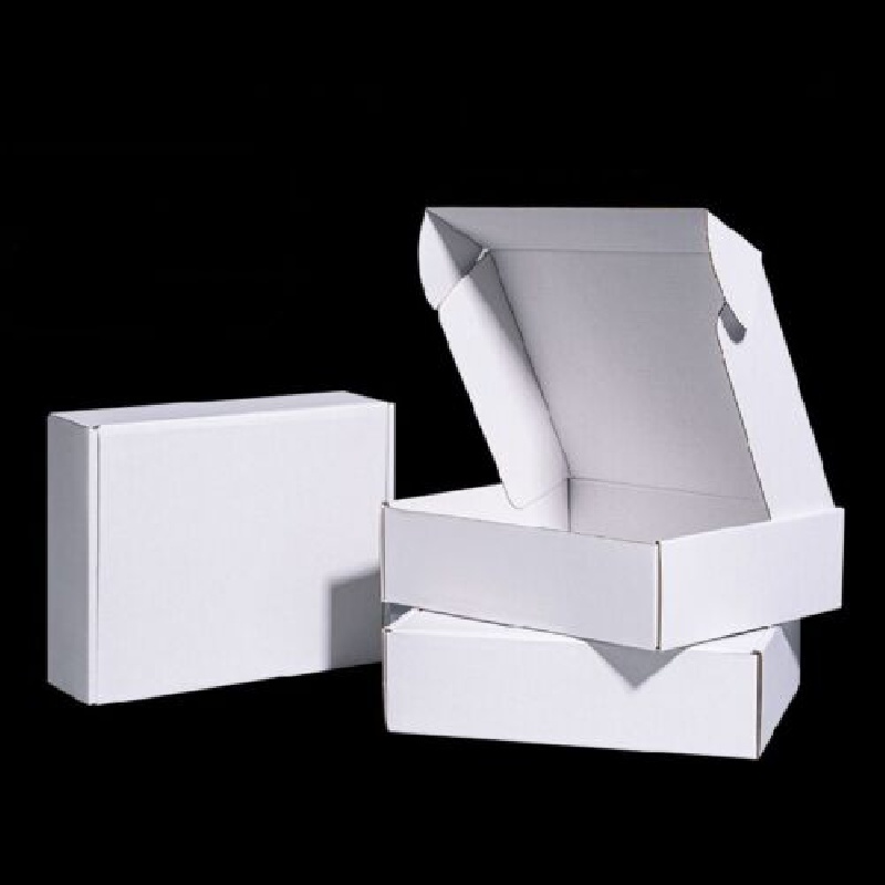 Cajas plegables de cartón ondulado, blancas