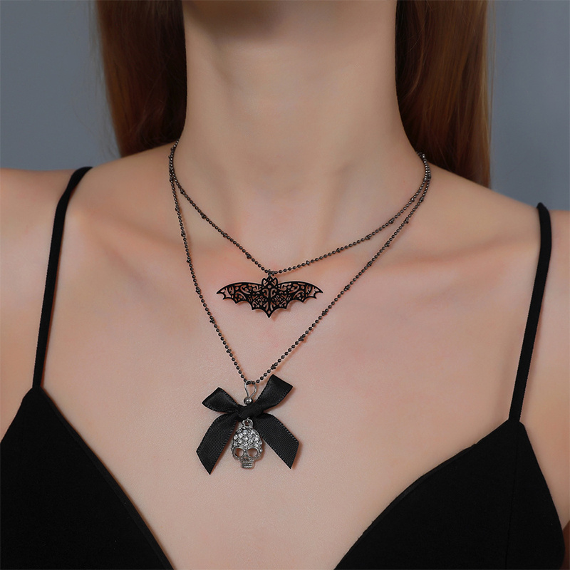 Bat hot sale skull necklace