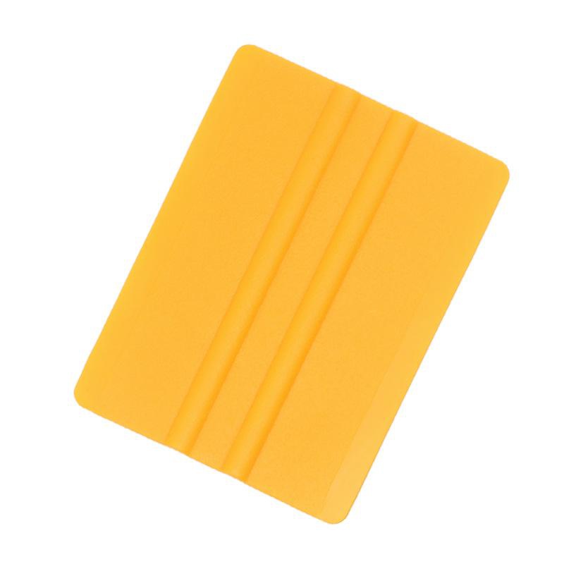 Yellow plastic squeegee 