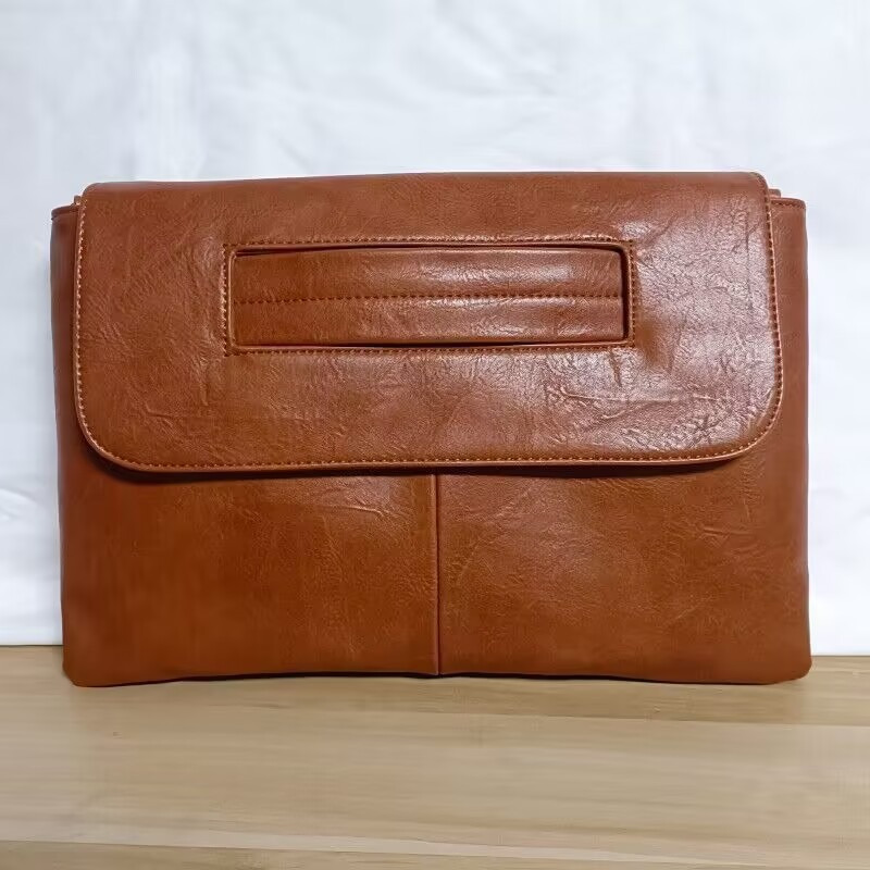 Light brown clutch discount bag