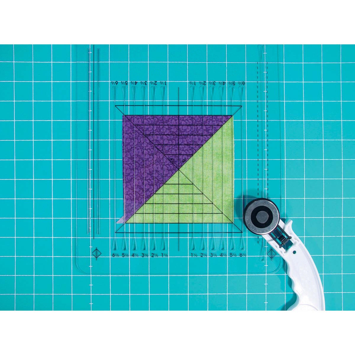 Learn to make perfect Half Square Triangles with this ruler